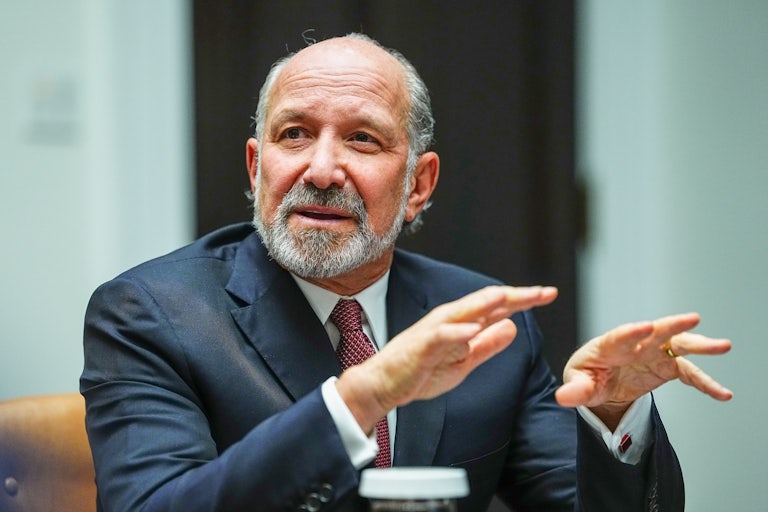 Commerce Secretary Howard Lutnick gestures as he speaks