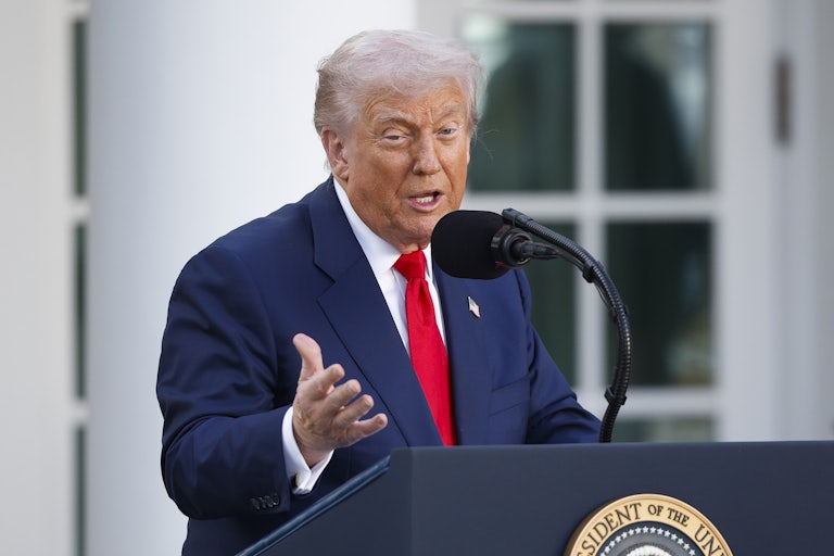 Donald Trump speaks at the presidential podium as awards Charlie Kirk the presidential medal of honor.