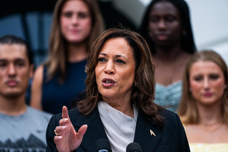 Kamala Harris gestures as she speaks outside the White House