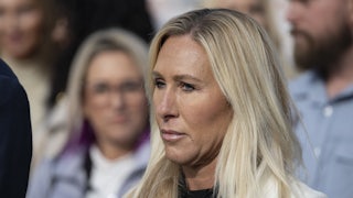 Representative Marjorie Taylor Greene stands outside the Capitol
