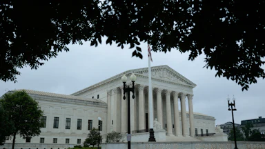 The Supreme Court building is seen from an angle.