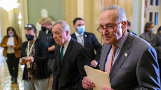 Senate Majority Leader Chuck Schumer and Majority Whip Dick Durbin walk to the Senate Chamber.