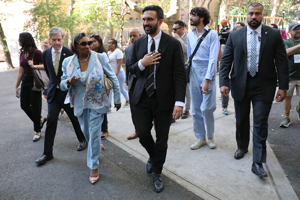 Zohran Mamdani walking with members of the New York State Assembly