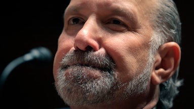 Commerce Secretary Howard Lutnick presses his lips together during a Senate subcommittee hearing