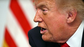 Donald Trump participates in a video call with military service members from his Mar-a-Lago residence in Palm Beach.