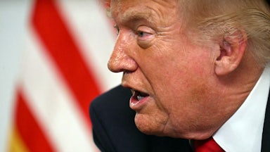 Donald Trump participates in a video call with military service members from his Mar-a-Lago residence in Palm Beach.