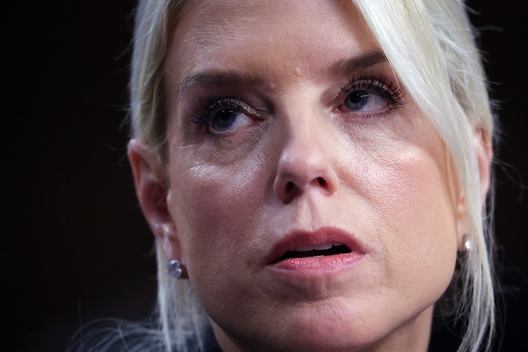 Attorney General Pam Bondi looks up while speaking in a Senate hearing