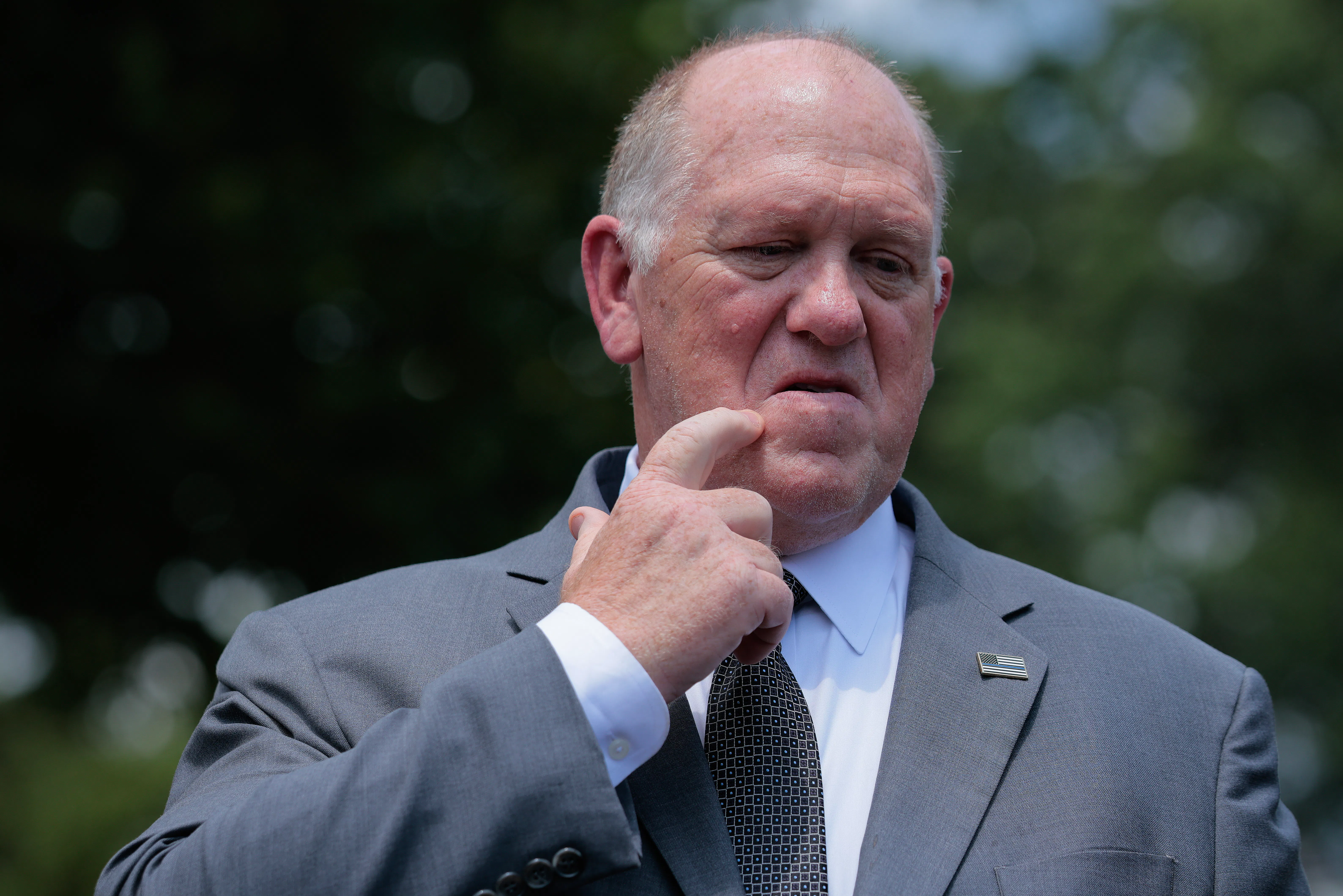 border czar tom homan scratches face