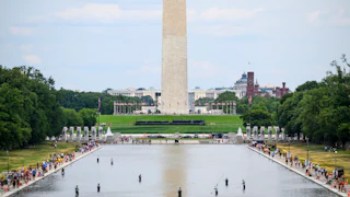 The Washington Monument is visible behind the Lincoln Memorial Reflecting Pool on Sunday, June 21.