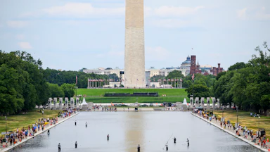 The Washington Monument is visible behind the Lincoln Memorial Reflecting Pool on Sunday, June 21.
