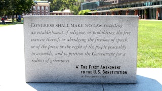 A marble plaque reading of the First Amendment To The U.S. Constitution sits on Independence Mall in Philadelphia.
