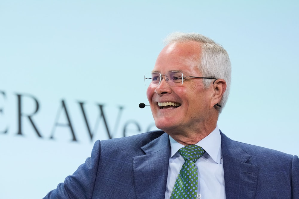 Darren Woods smiles.