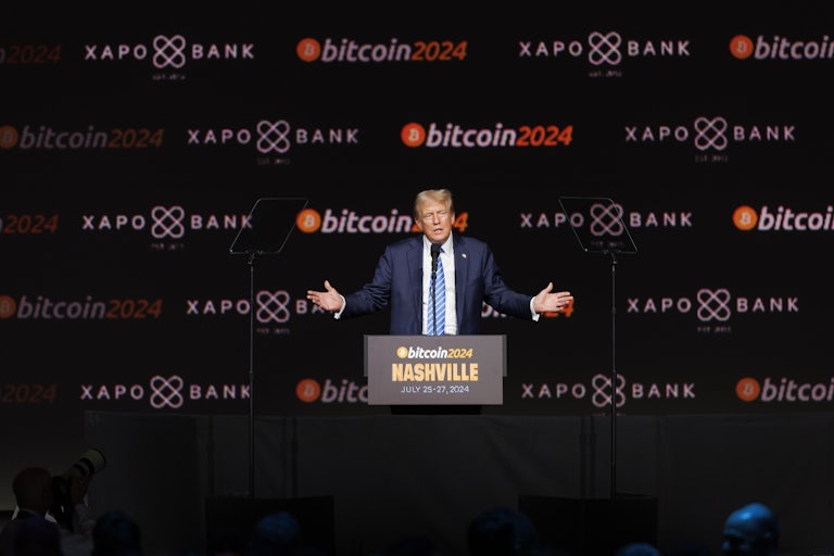 Donald Trump gestures while speaking at the Bitcoin conference