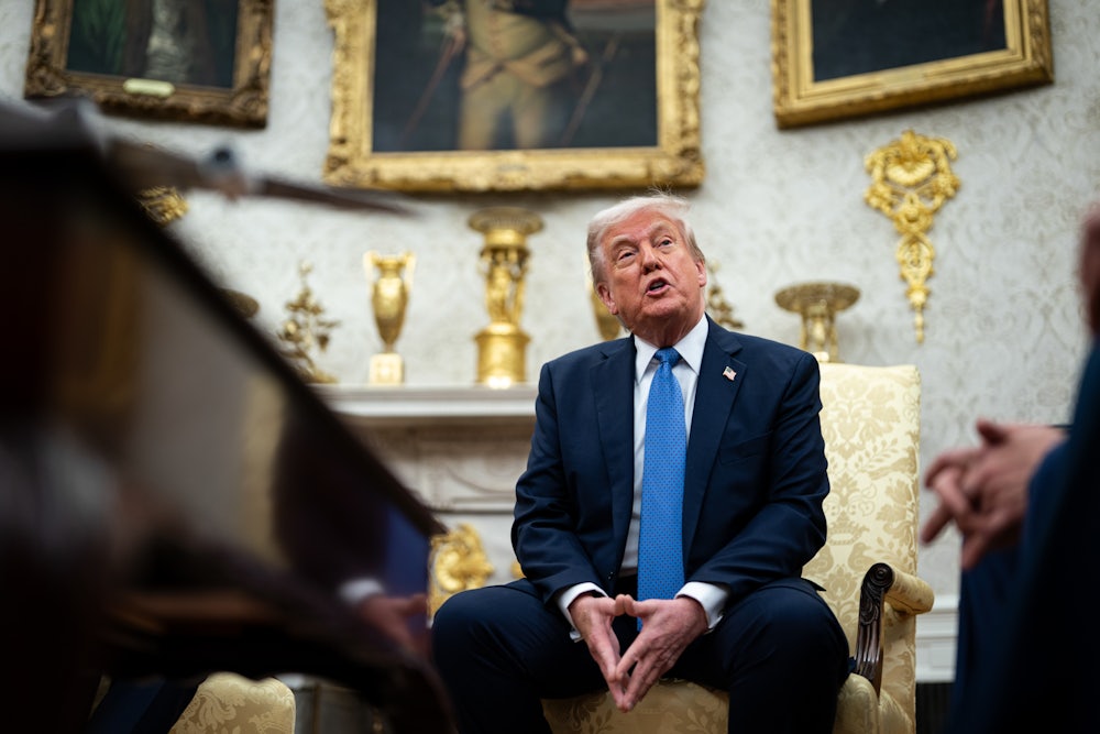 Donald Trump speaks during a meeting in the Oval Office.