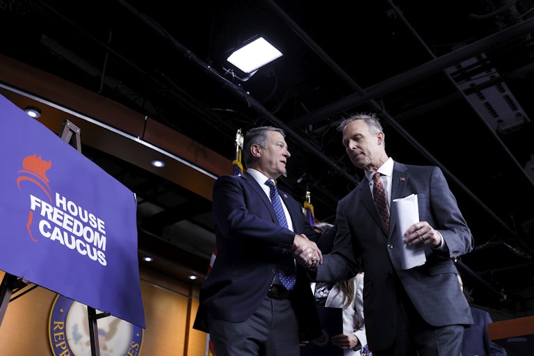 Ronny Jackson and Scott Perry shake hands