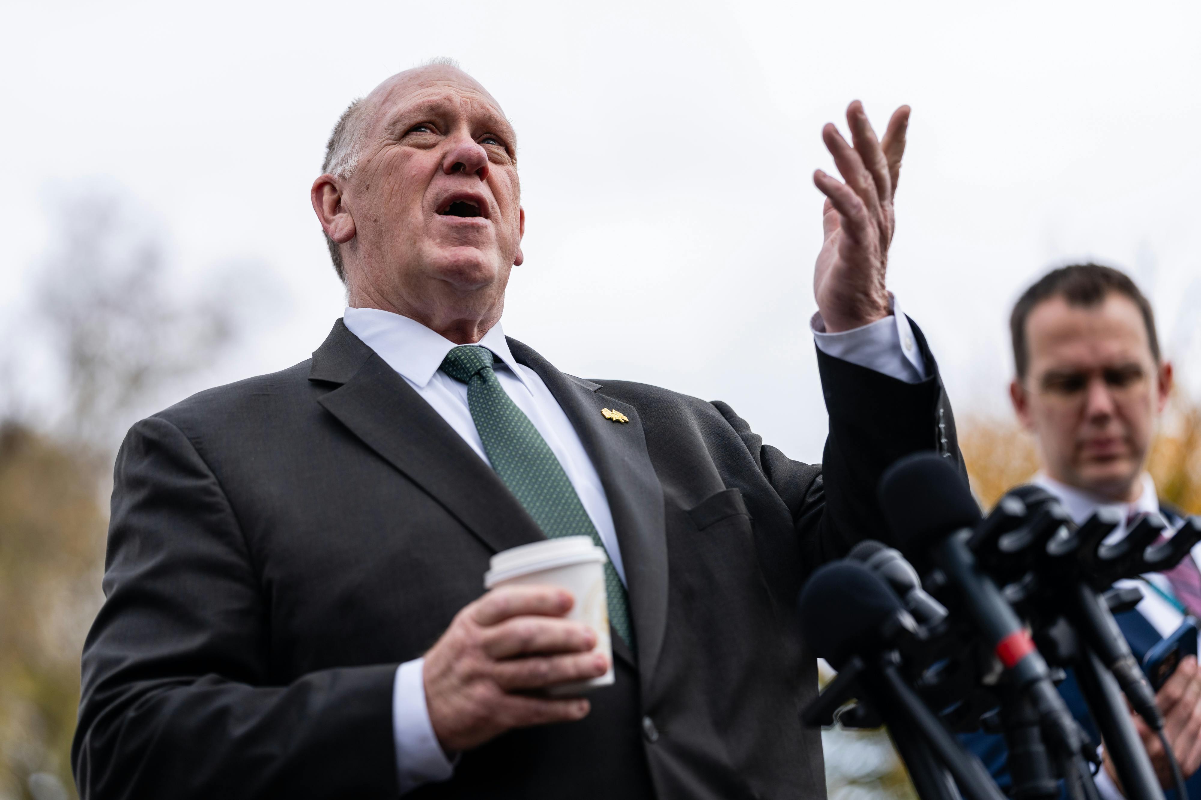 Trump's border czar Tom Homan speaks into a microphone.