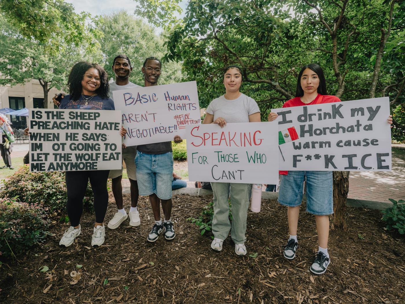 Students share their thoughts at a No Kings rally in Spartanburg, South Carolina. 