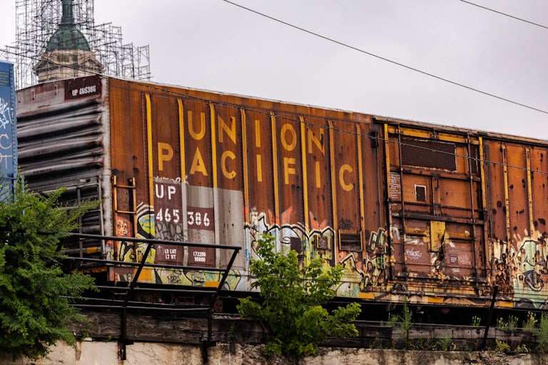 Union Pacific shipping container on a railroad