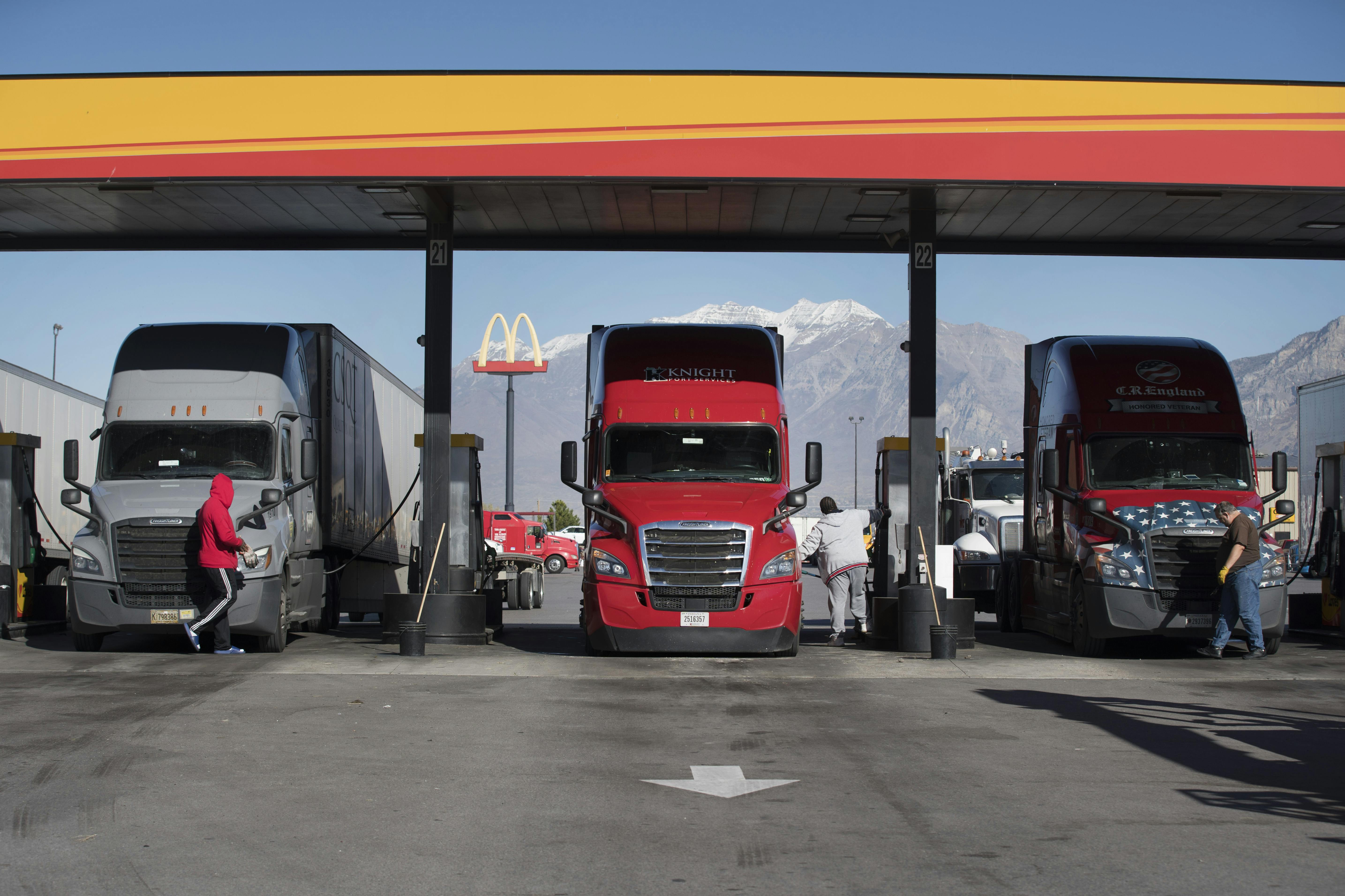 truck drivers at a gas station
