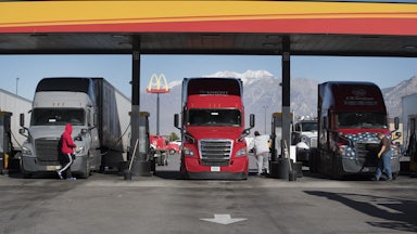 truck drivers at a gas station