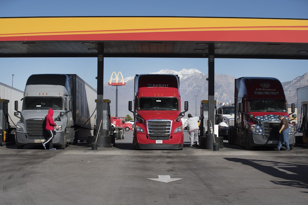 truck drivers at a gas station