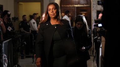 New York Attorney General Letitia James walks in a courtroom.