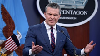 Defense Secretary Pete Hegseth makes a weird face while speaking in a Pentagon briefing.