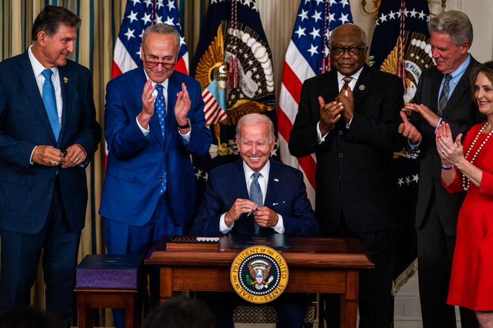 Biden signs the Inflation Reduction Act into law