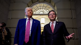 Speaker of the House Mike Johnson accompanied by U.S. President Donald Trump, speaks to members of the media.