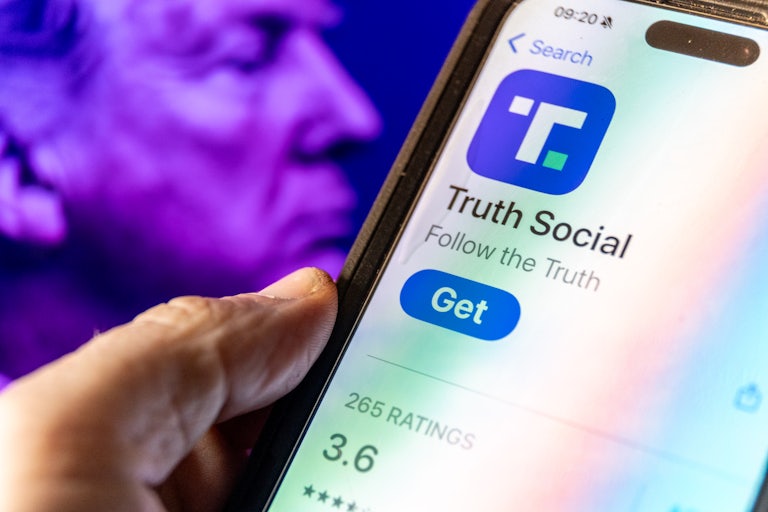 The App Store page for Truth Social is seen on a phone