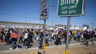 People protest against immigration detention centers in Dilley, Texas