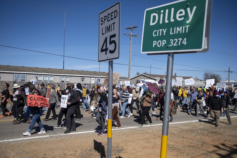 People protest against immigration detention centers in Dilley, Texas
