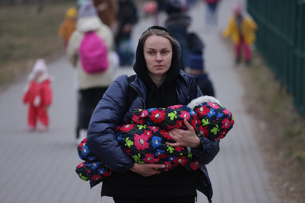 Mother and infant from Ukraine at the Medyka border crossing