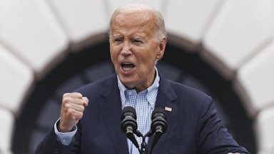 President Biden speaking at the White House with clenched right fist