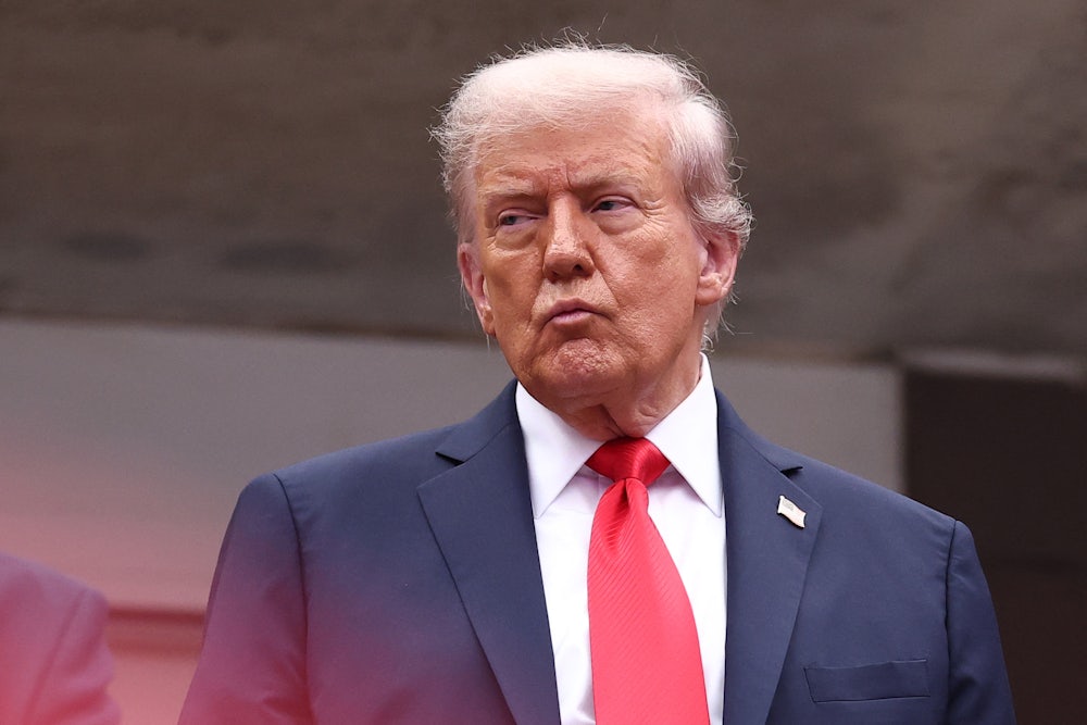 Donald Trump purses his lips at the U.S. Open