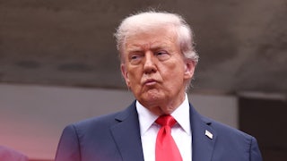 Donald Trump purses his lips at the U.S. Open