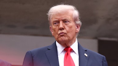 Donald Trump purses his lips at the U.S. Open