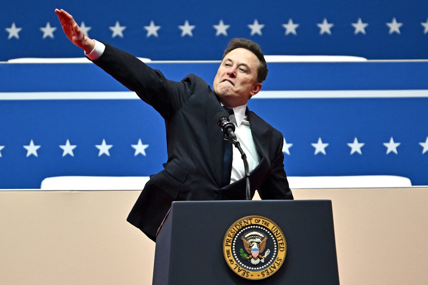 Elon Musk appears to make a Nazi salute as he speaks during Donald Trump's inaugural parade, January 20, 2025. 