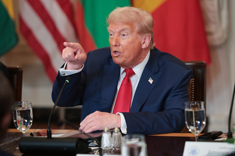 Donald Trump points as he speaks at a meeting with African leaders.