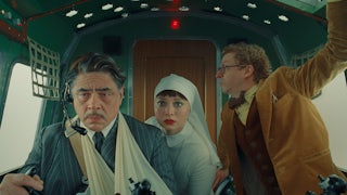 Benicio Del Toro, Mia Threapleton, and Michael Cera in “The Phoenician Scheme.”