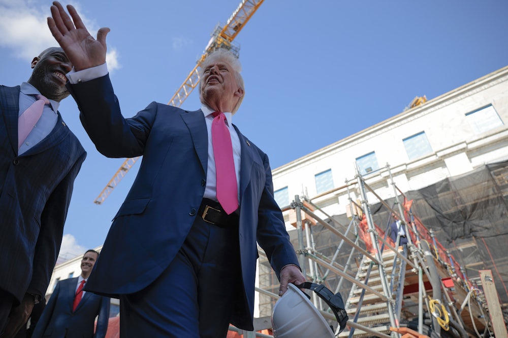 President Donald Trump delivers remarks alongside Sen. Tim Scott as they tour the Federal Reserve’s $2.5 billion headquarters renovation project in Washington, D.C.