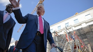 President Donald Trump delivers remarks alongside Sen. Tim Scott as they tour the Federal Reserve’s $2.5 billion headquarters renovation project in Washington, D.C.