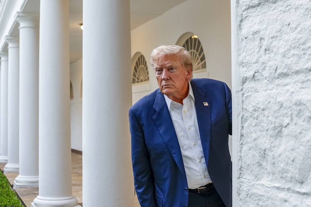 A sweaty Trump leans forward in the Rose Garden