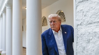 A sweaty Trump leans forward in the Rose Garden