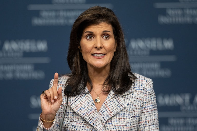 Nikki Haley raises an index finger for emphasis while speaking