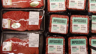 A column of "London broil" beef lies next to several columns of Impossible ground plant-based meat.