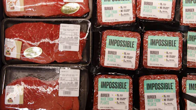 A column of "London broil" beef lies next to several columns of Impossible ground plant-based meat.