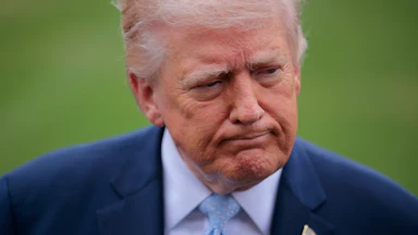 Donald Trump purses his lips together