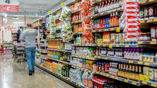 A person shops in a grocery store