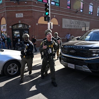 CBP Chief Gregory Bovino yells while walking in Chicago with masked federal immigration agents
